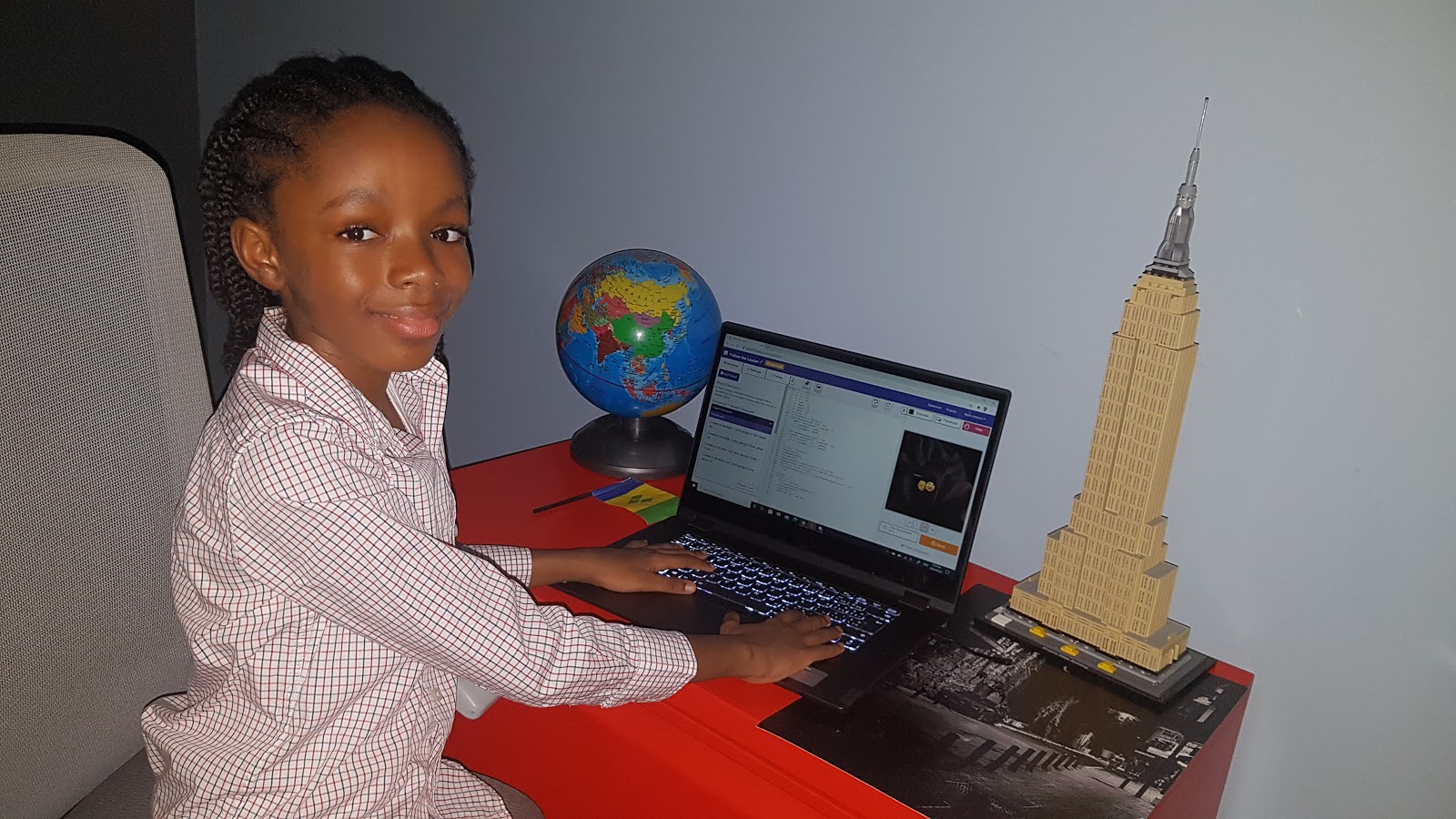 Nyles at his computer, coding.
